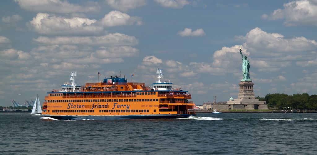Staten Island ferry passes the Statue of Liberty